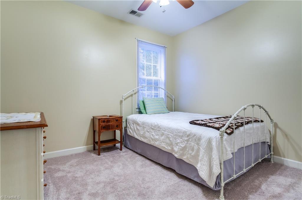 6599 Currieton Drive Oak Ridge, NC 27310 - Photo 15 of 30 The 3rd bedroom also features new carpet and fresh paint!