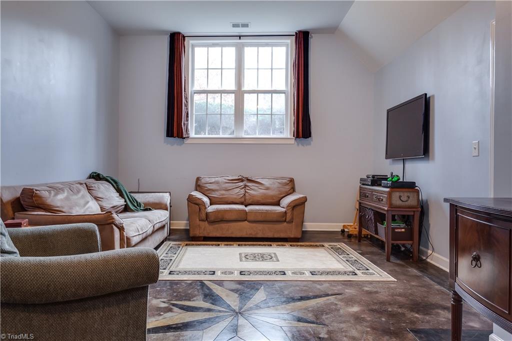 6599 Currieton Drive Oak Ridge, NC 27310 - Photo 21 of 30 Check out the beautiful concrete flooring!