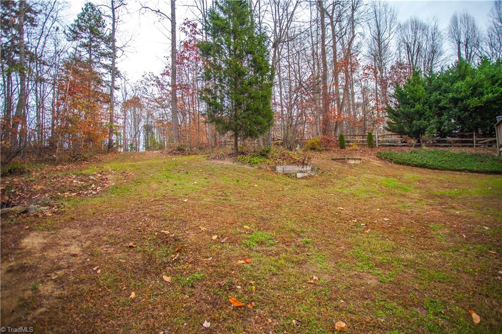 6599 Currieton Drive Oak Ridge, NC 27310 - Photo 25 of 30 The lot is oversized with 2.3 acres, offering plenty of play space!