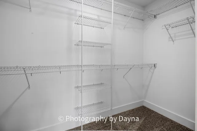 a view of a room with racks on the wall