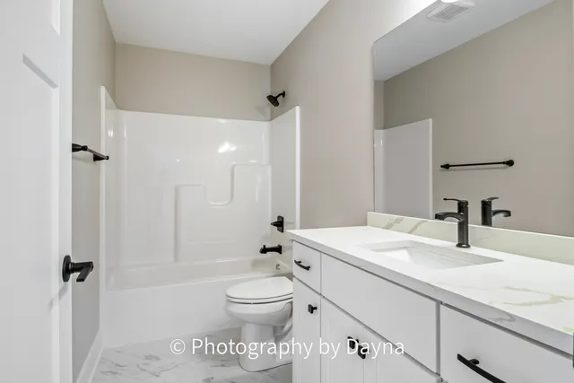 a view of a room with rack and more cabinets