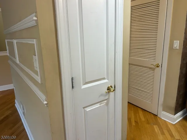 a view of a bathroom from the hallway