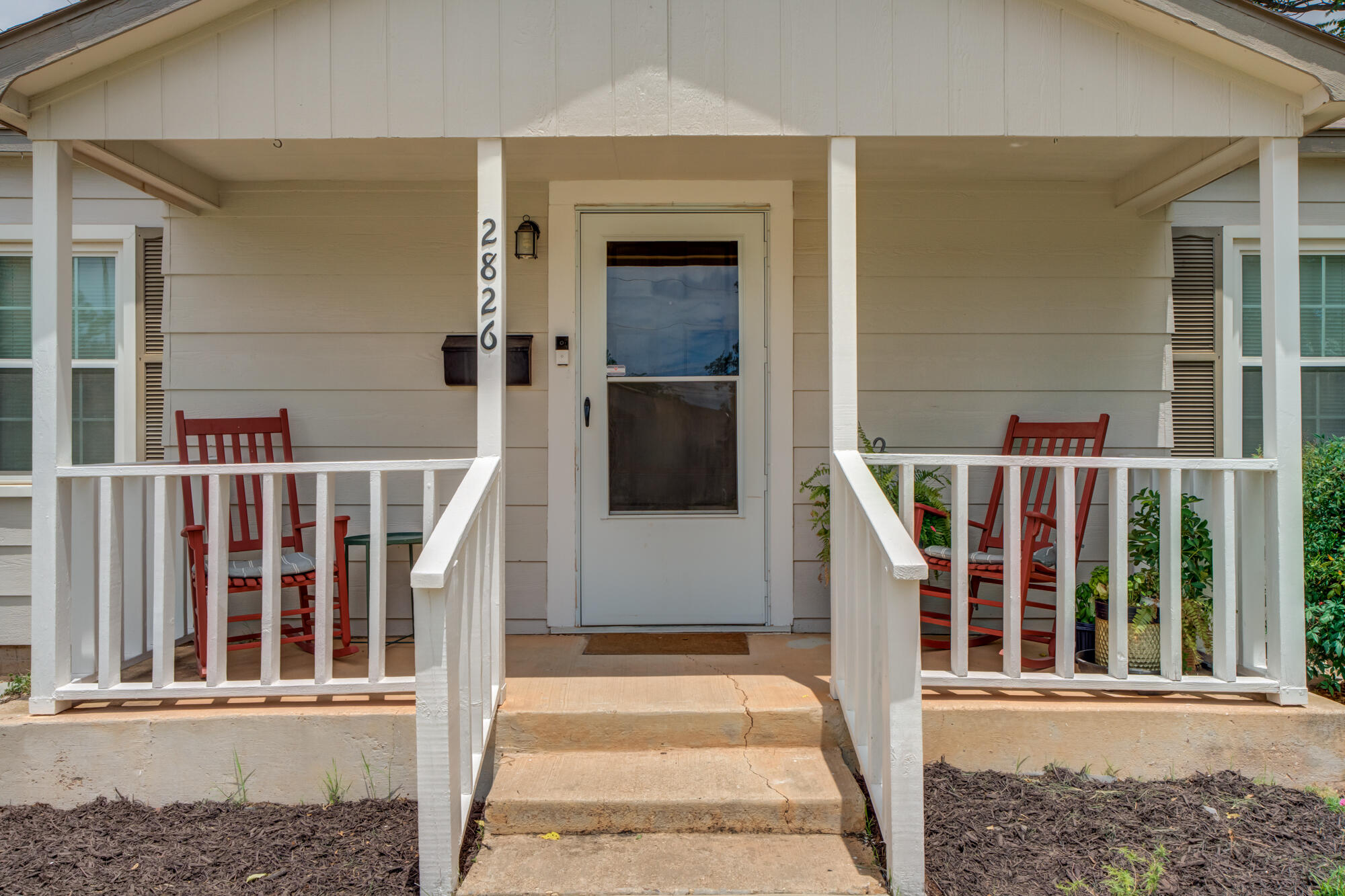 2826 33rd Street Lubbock, TX 79410 - Photo 3 of 33 front view of a house with a porch