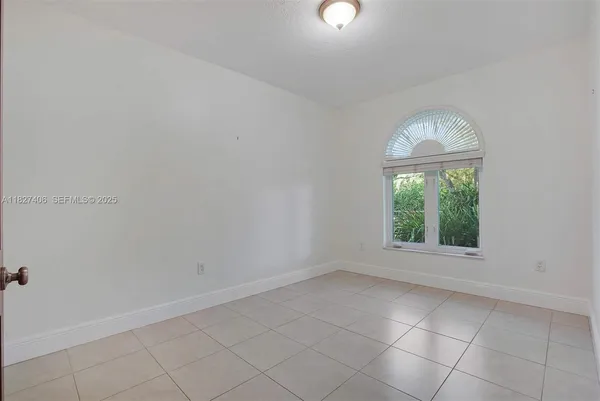 a view of workspace with furniture and a window