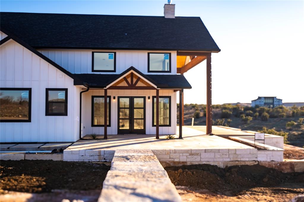 a front view of a house with yard