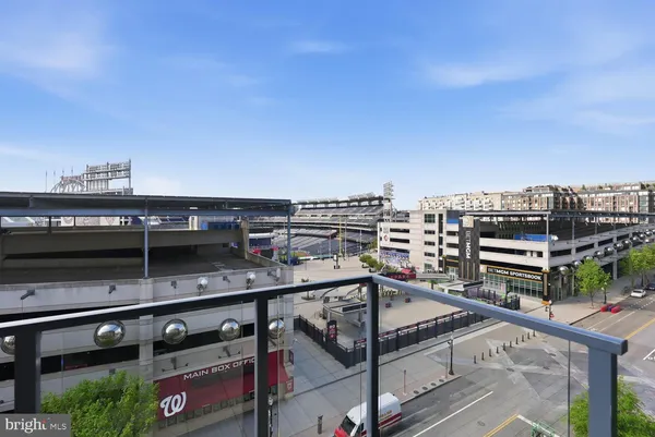 an empty room with a ceiling fan and a window