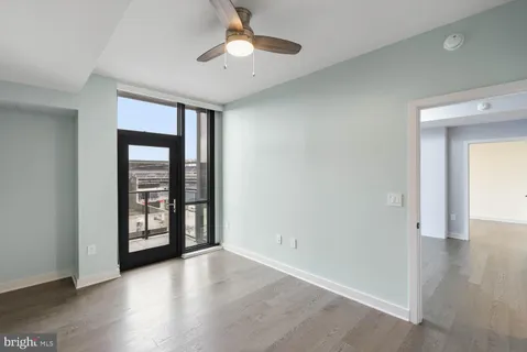 a view of a balcony with furniture