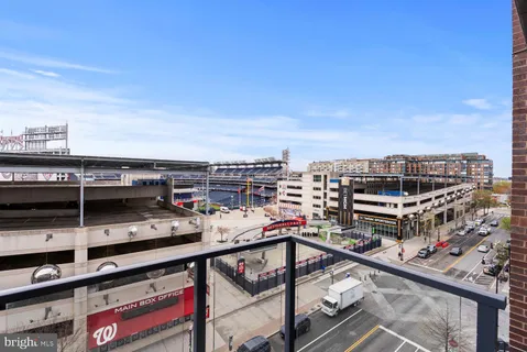 a bed room with a bed and a chair