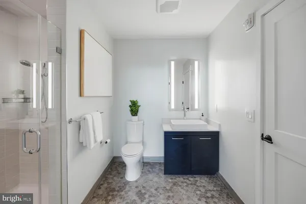 a view of a brick building with a door and a window