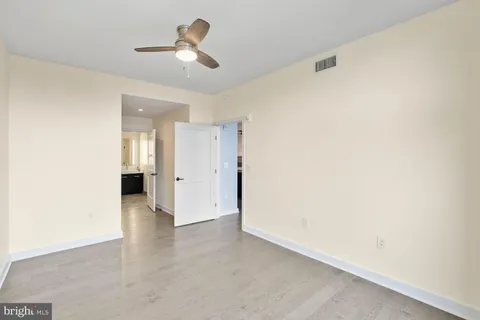 a view of an empty room with shelves