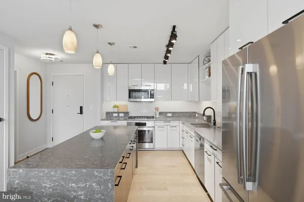 a view of a balcony with furniture