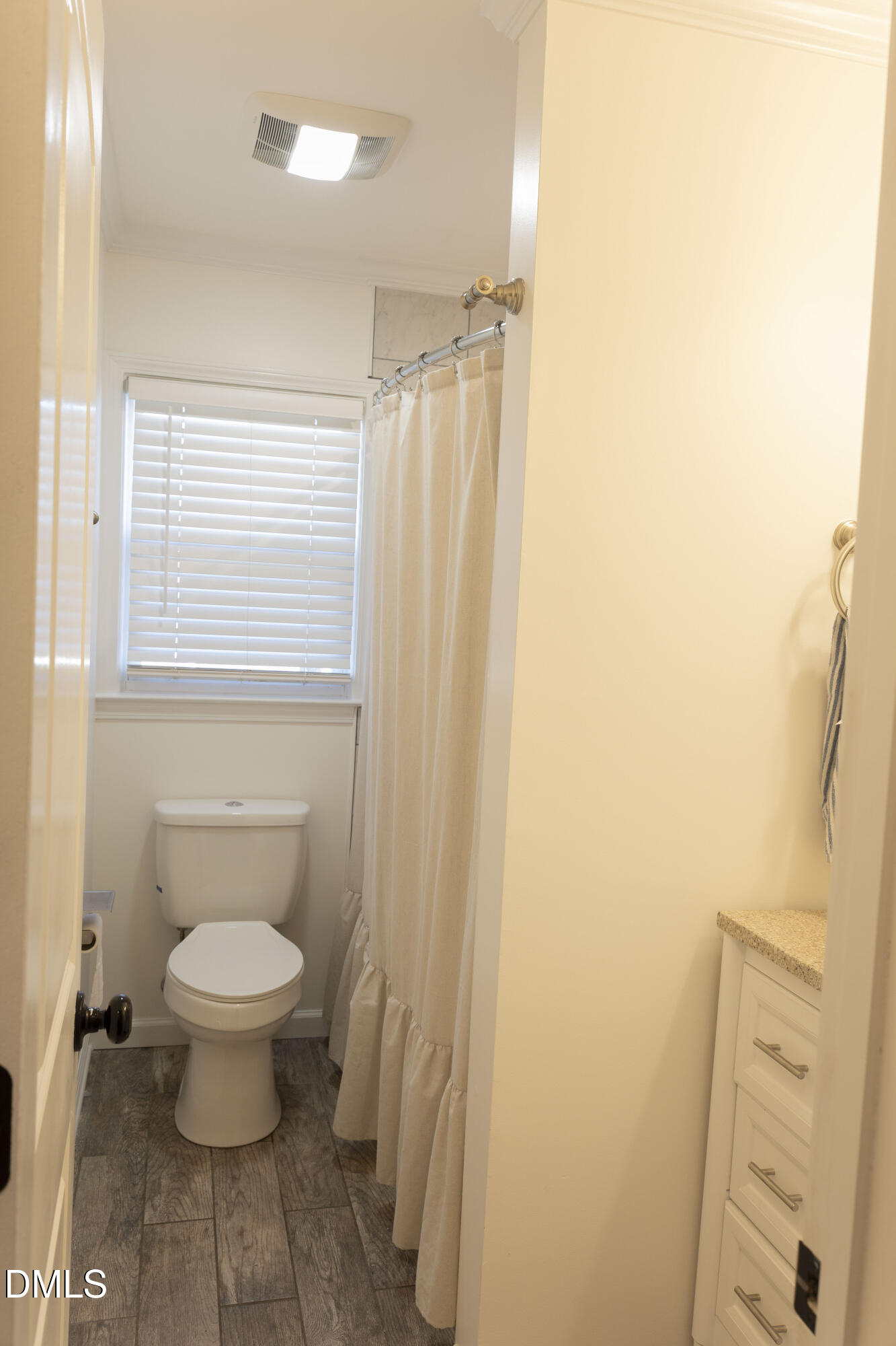 7301 Cleveland School Road Garner, NC 27529 - Photo 26 of 73 a bathroom with a toilet and a sink