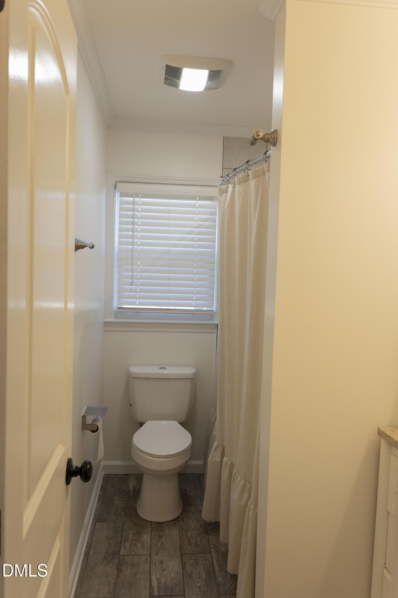 7301 Cleveland School Road Garner, NC 27529 - Photo 28 of 73 a bathroom with a toilet and a shower