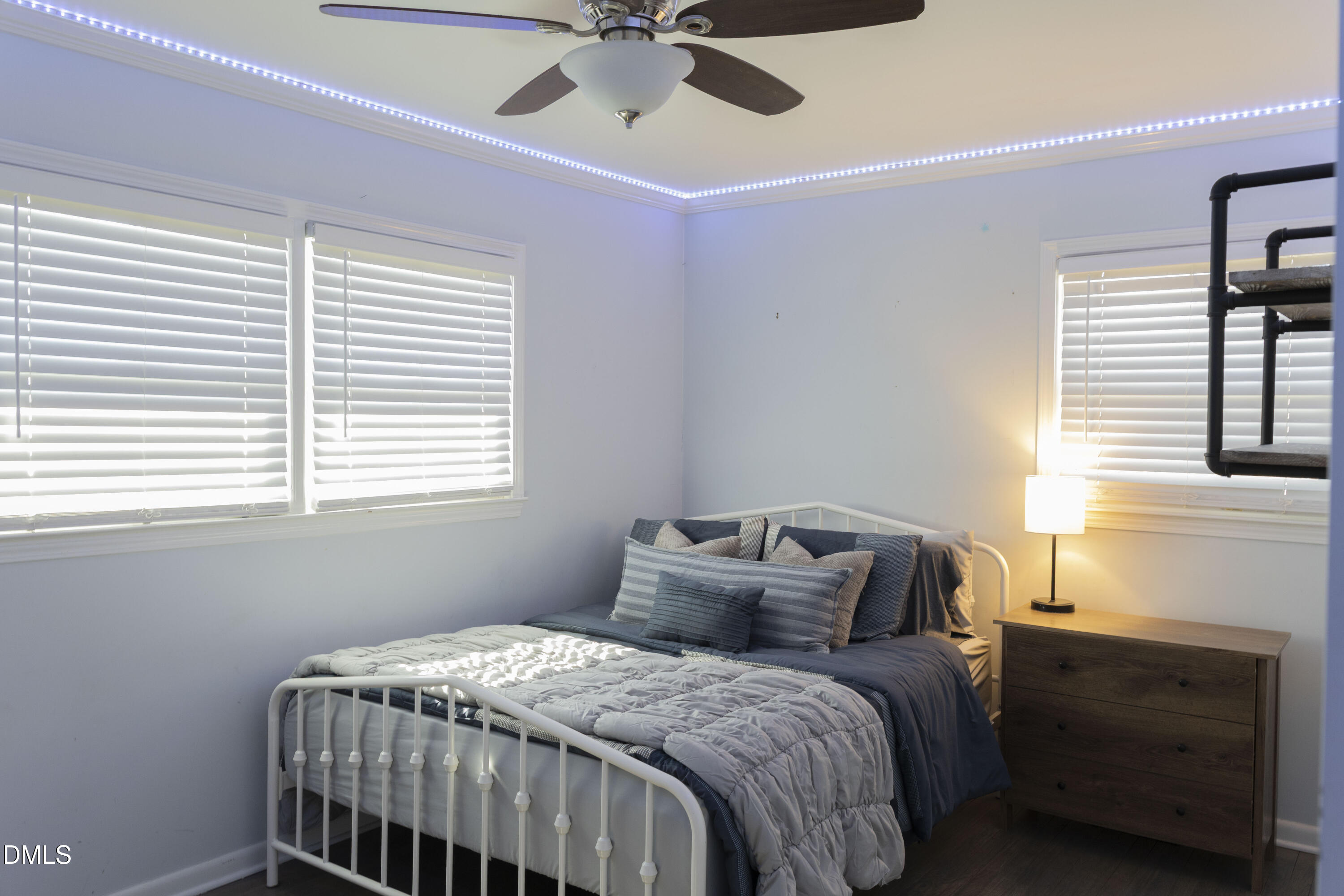 7301 Cleveland School Road Garner, NC 27529 - Photo 31 of 73 a bedroom with a bed and a window