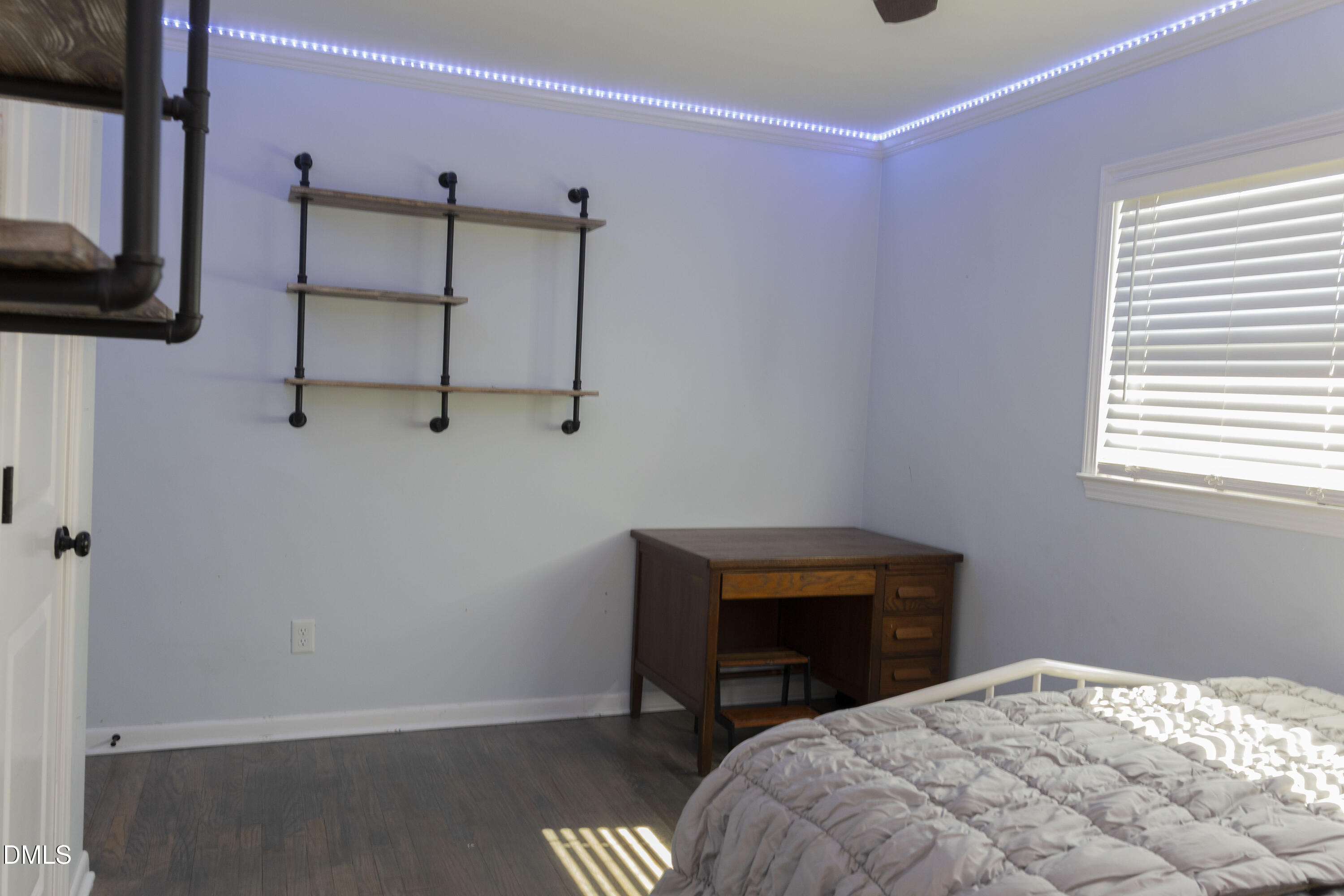 7301 Cleveland School Road Garner, NC 27529 - Photo 33 of 73 a bedroom with a bed a desk and chair