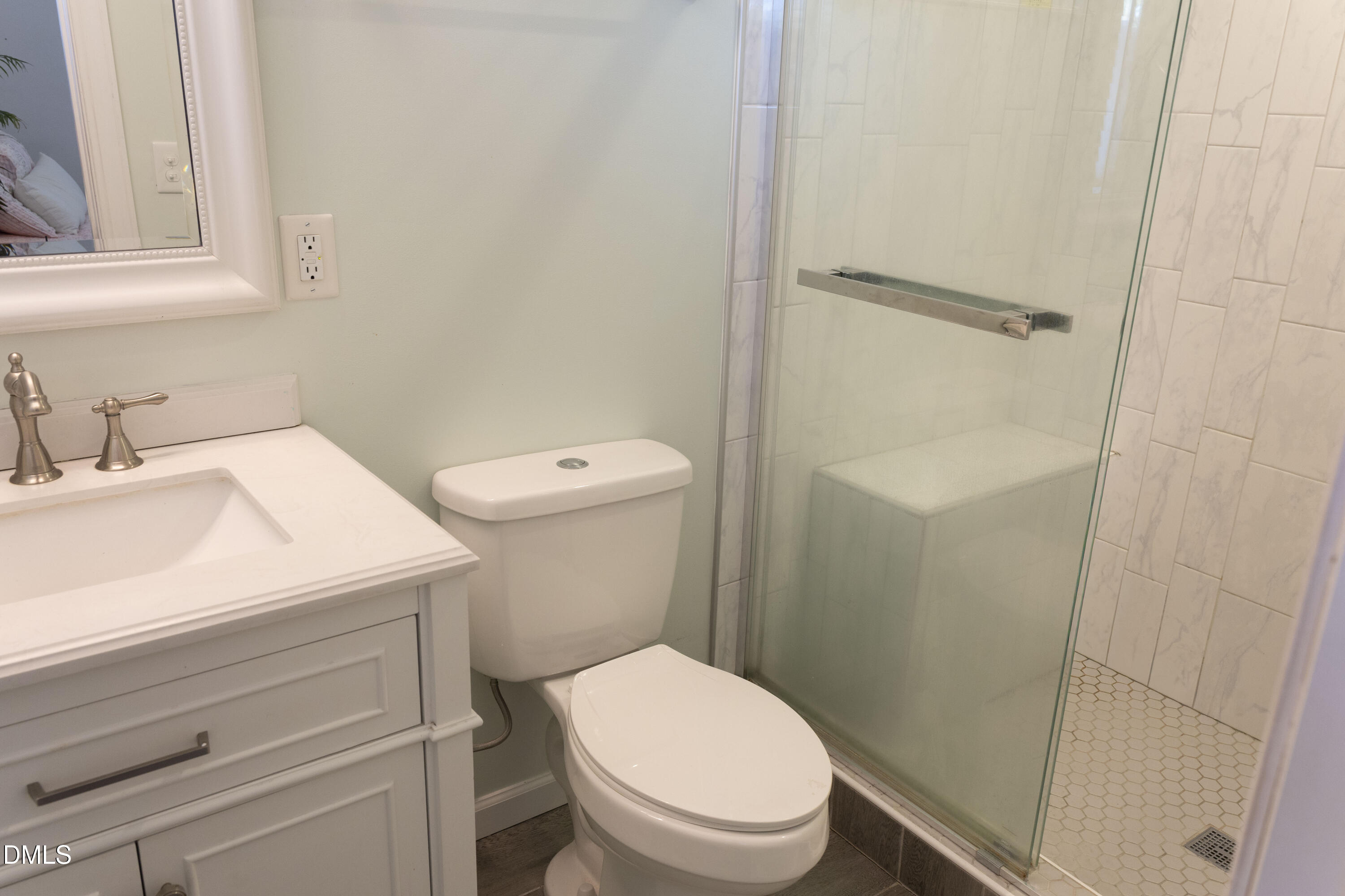 7301 Cleveland School Road Garner, NC 27529 - Photo 40 of 73 a white toilet sitting next to a bathroom sink