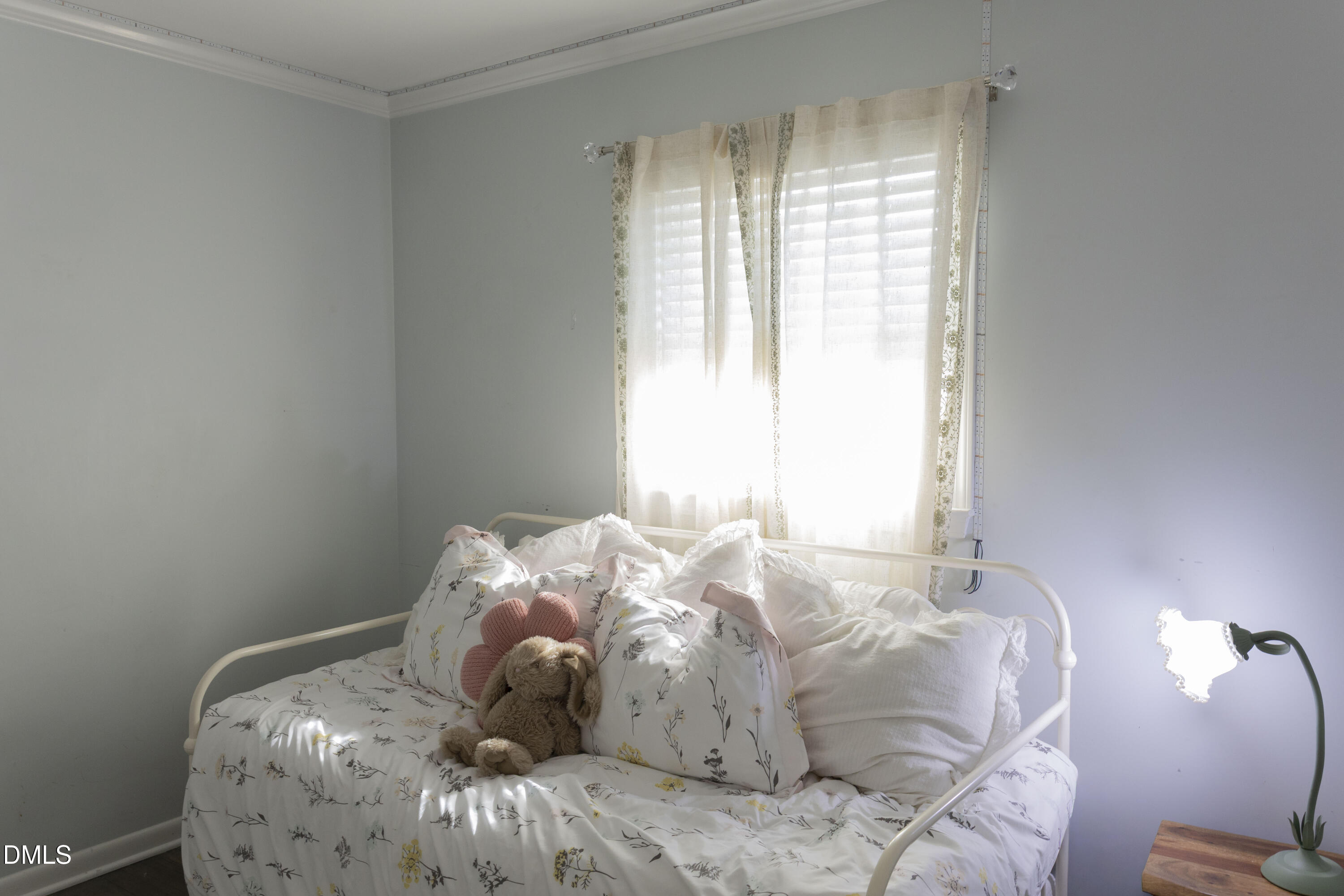 7301 Cleveland School Road Garner, NC 27529 - Photo 45 of 73 a bedroom with a bed and window