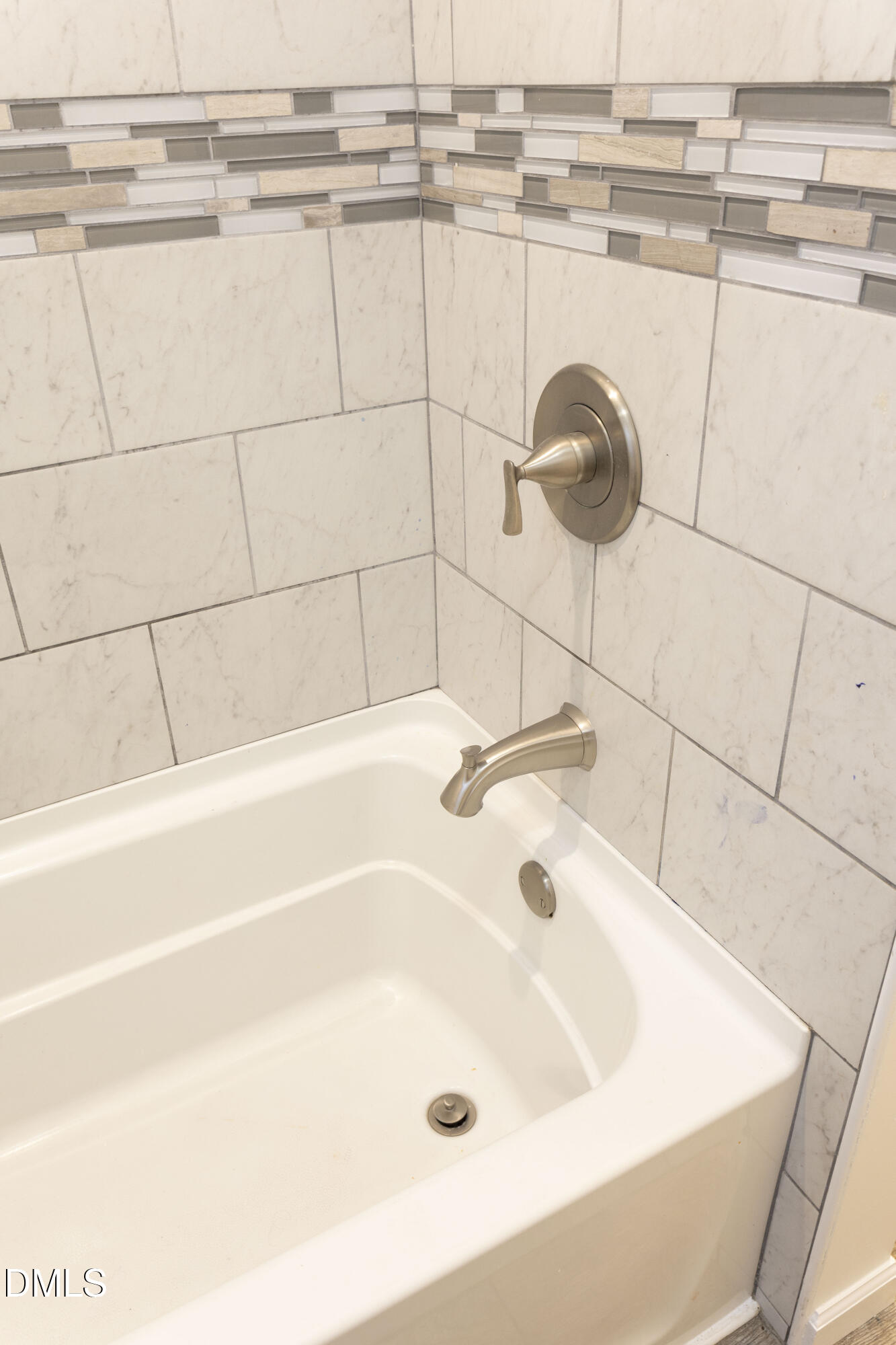 7301 Cleveland School Road Garner, NC 27529 - Photo 50 of 73 a bathroom with a bathtub