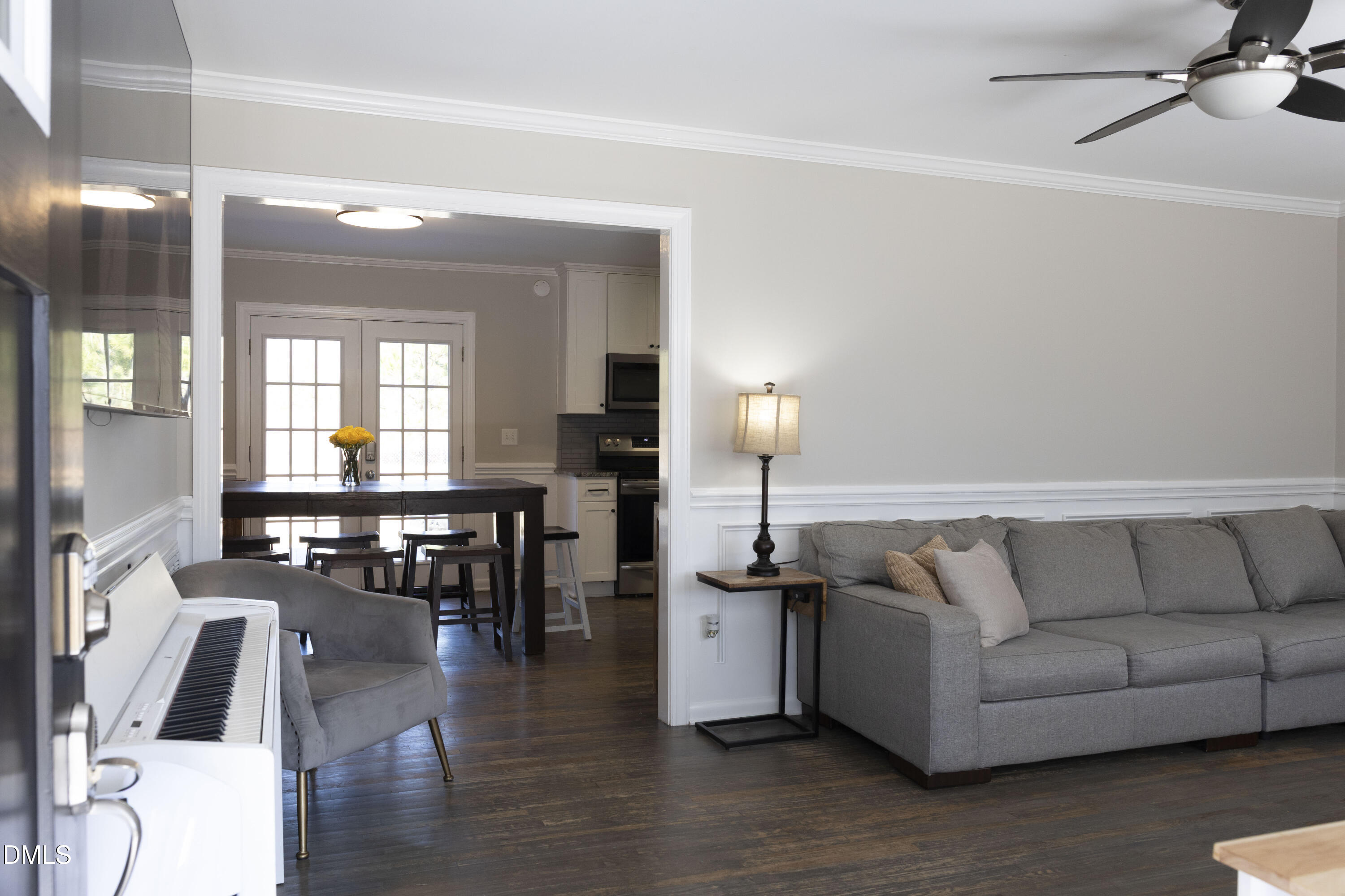 7301 Cleveland School Road Garner, NC 27529 - Photo 6 of 73 a living room with furniture and wooden floor
