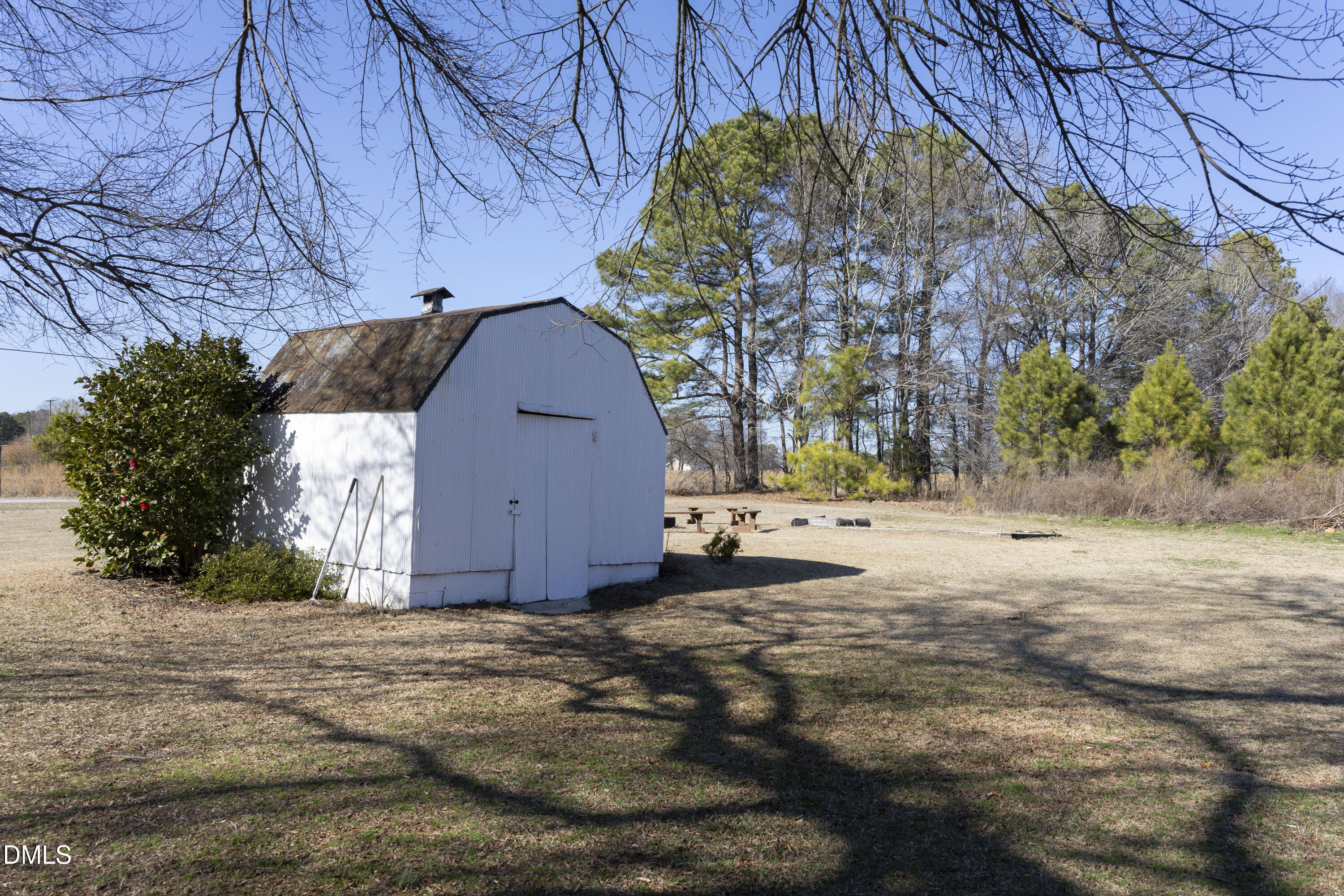 7301 Cleveland School Road Garner, NC 27529 - Photo 62 of 73 a backyard of a house with lots of green space