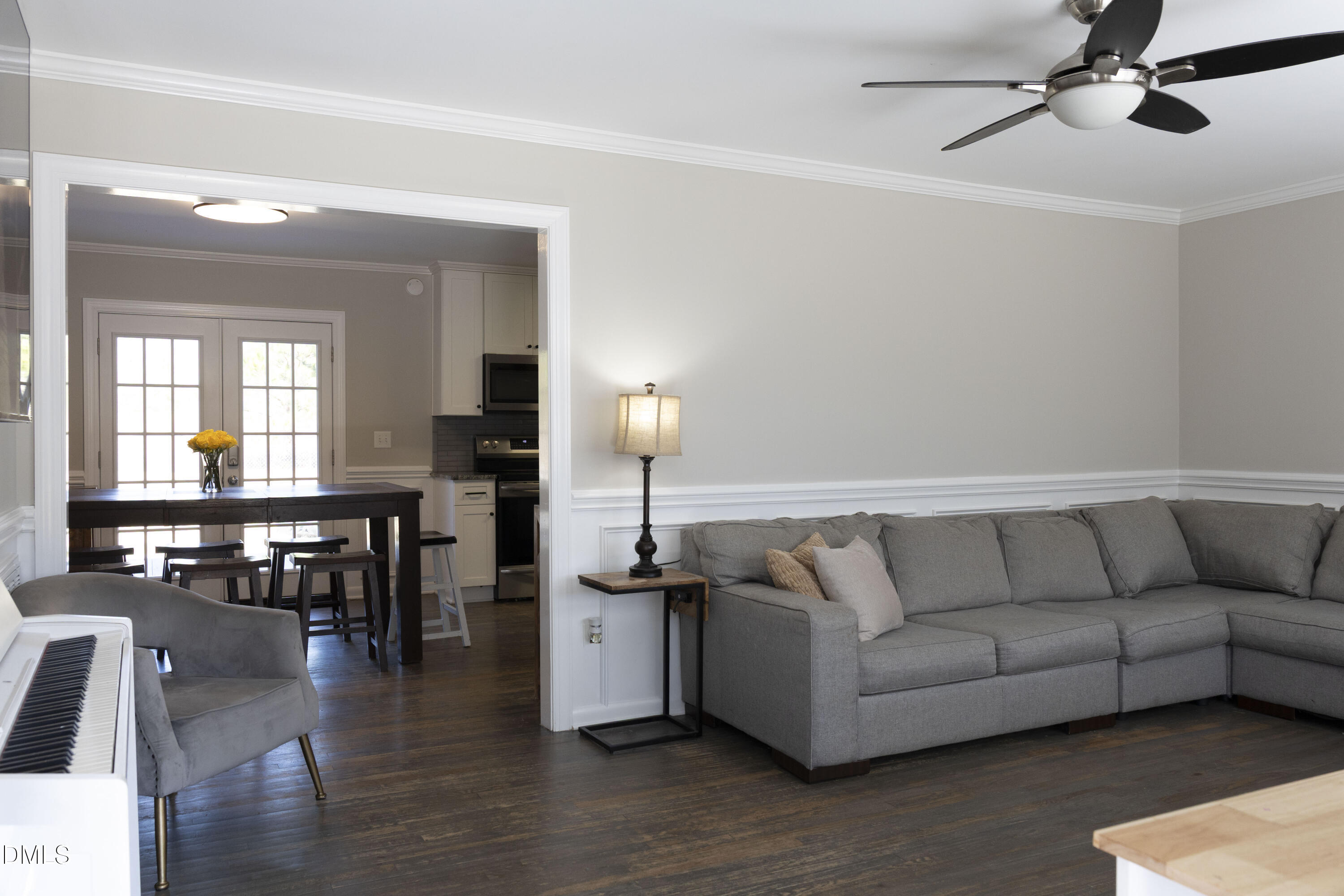 7301 Cleveland School Road Garner, NC 27529 - Photo 7 of 73 a living room with furniture and wooden floor