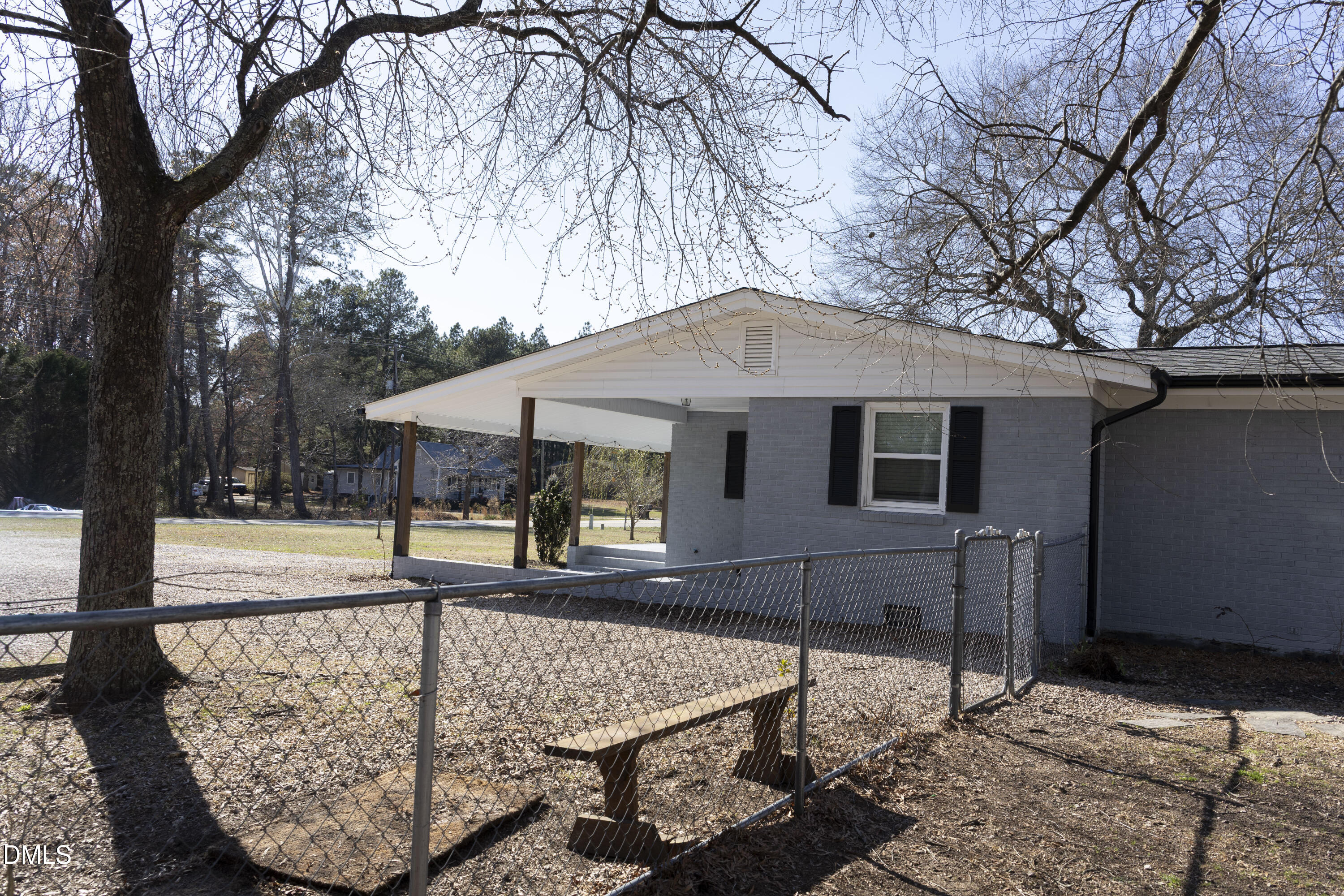 7301 Cleveland School Road Garner, NC 27529 - Photo 72 of 73 a front view of house with yard nad seating space