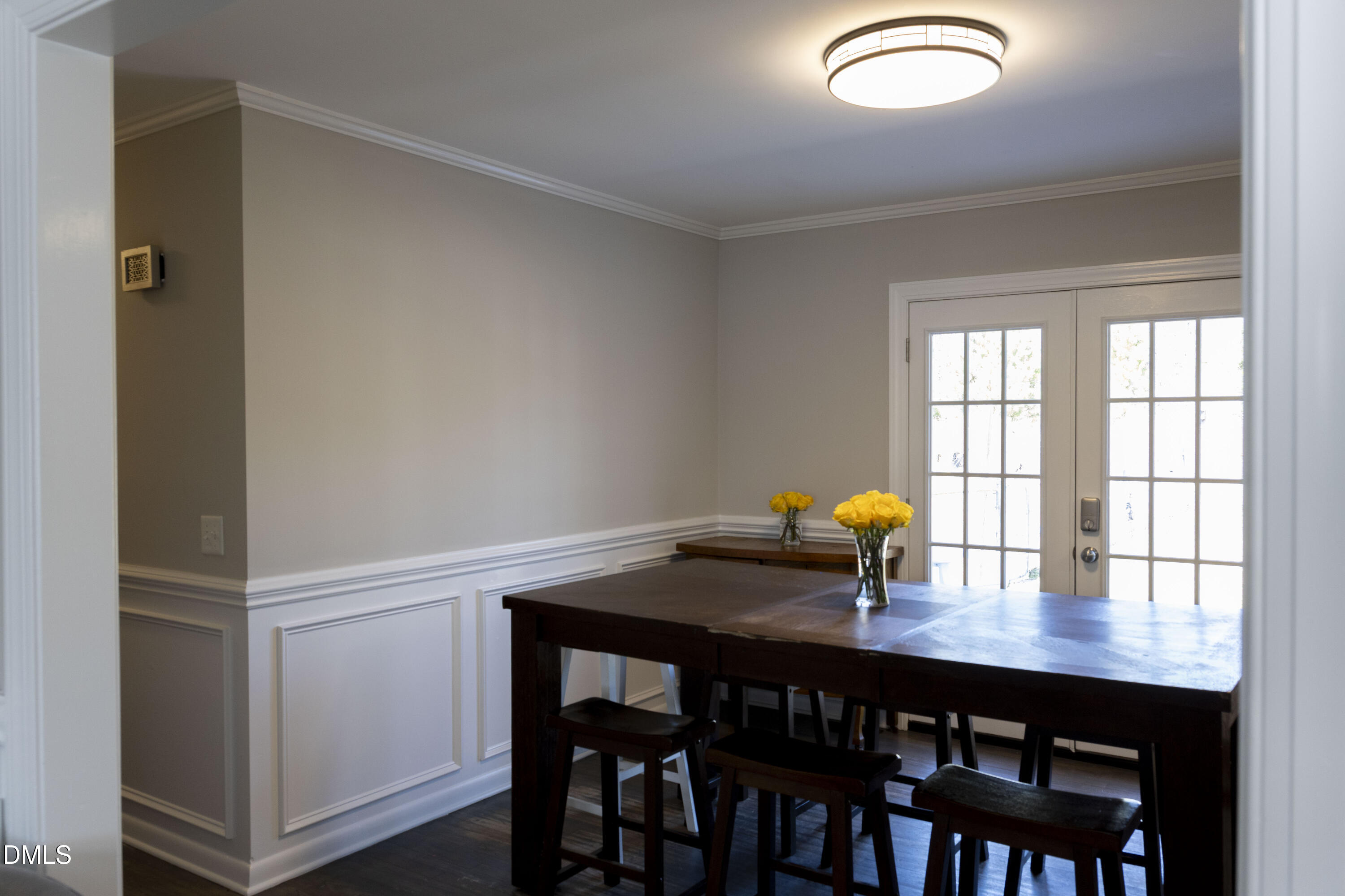 7301 Cleveland School Road Garner, NC 27529 - Photo 8 of 73 a view of a workspace room with a table and chairs