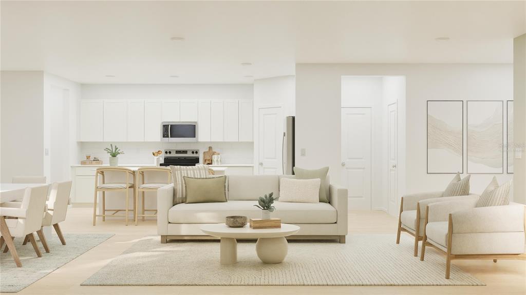 5102 Clay Whaley Road St. Cloud, FL 34772 - Photo 4 of 27 a living room with furniture white walls and white walls