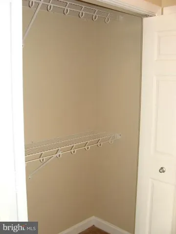 a view of a room with racks on the wall