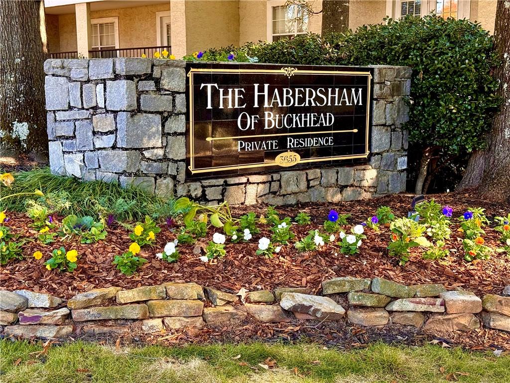 3655 Habersham Road Northeast, Unit A212 Atlanta, GA 30305 - Photo 21 of 21 a view of a street with a bunch of flowers