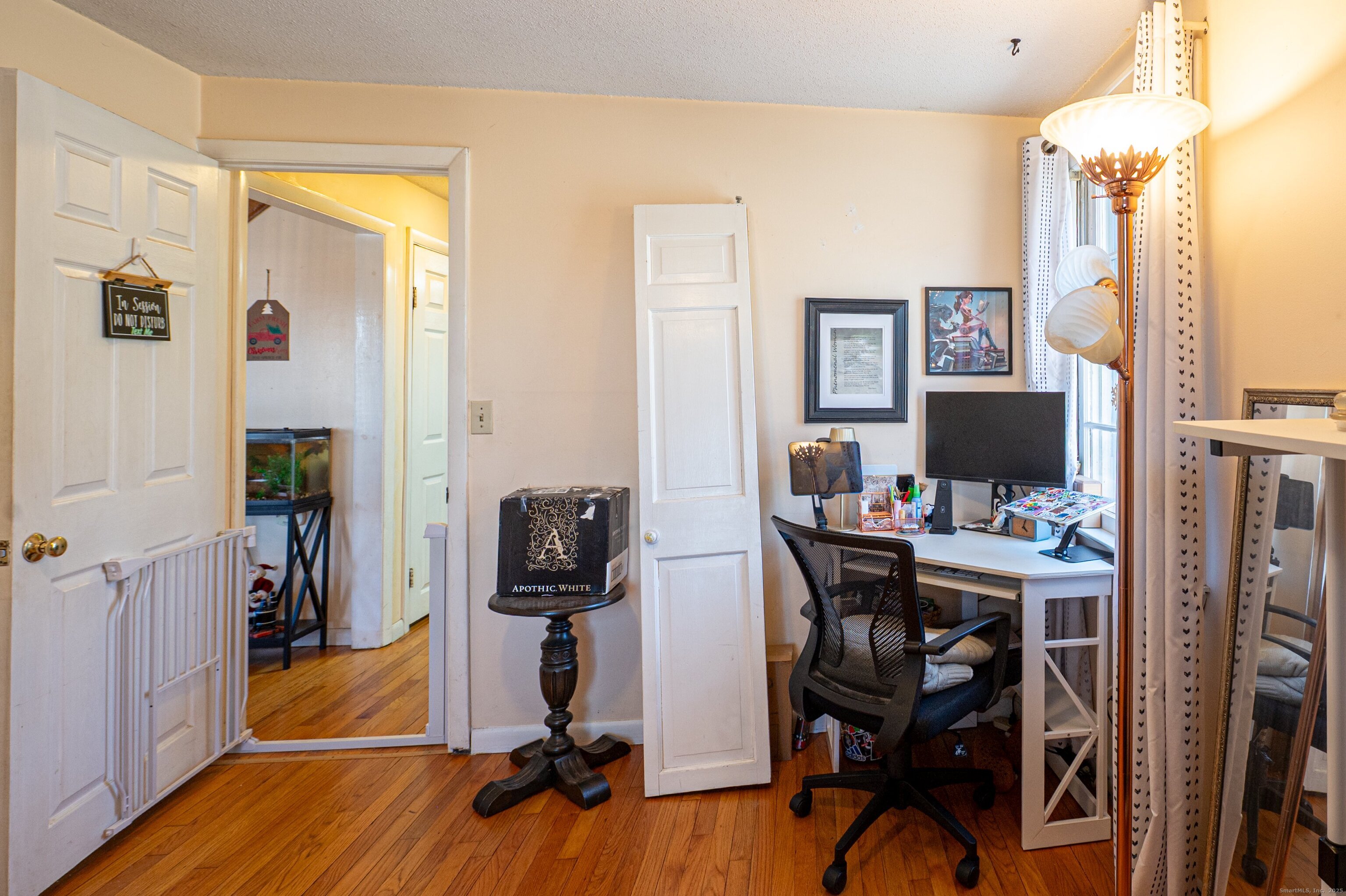 1940 Mt Vernon Road Southington, CT 06489 - Photo 14 of 24 a view of a workspace with furniture and a bedroom