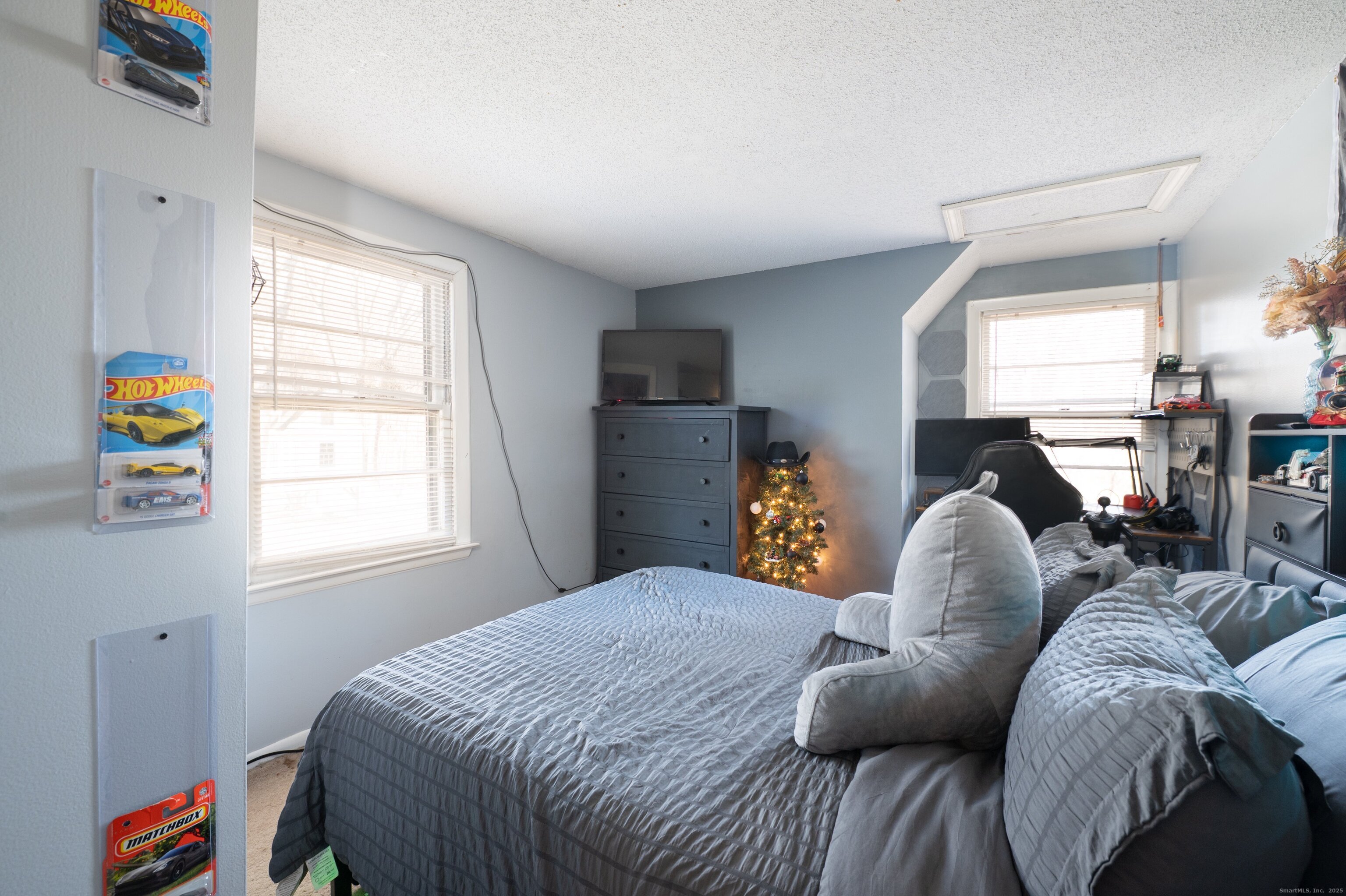 1940 Mt Vernon Road Southington, CT 06489 - Photo 18 of 24 a bed room with a bed and a window