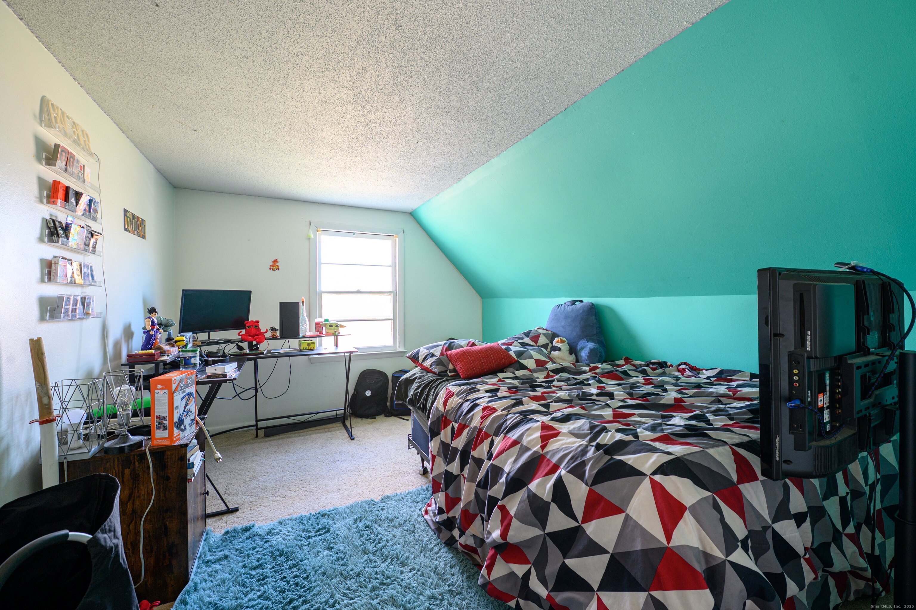 1940 Mt Vernon Road Southington, CT 06489 - Photo 19 of 24 a bedroom with a bed and a window