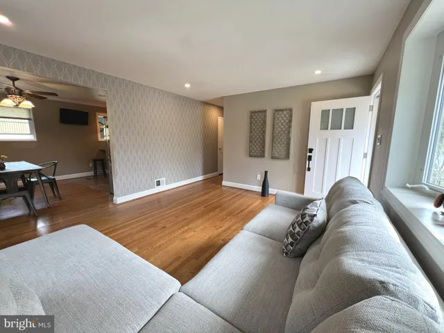 a bed room with a bed and a chair