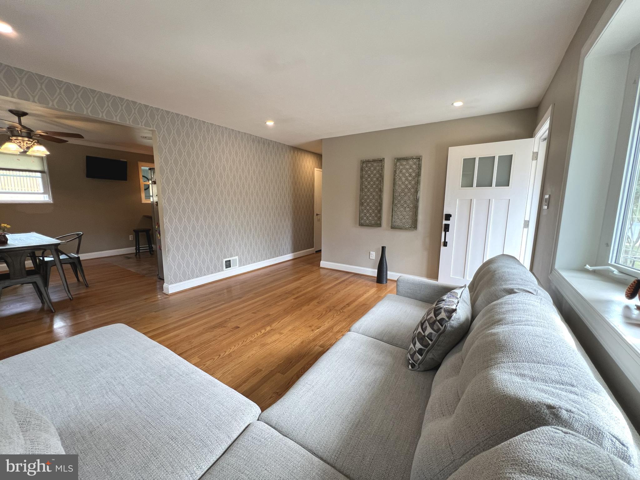 1001 Gabel Street Silver Spring, MD 20901 - Photo 11 of 46 a bed room with a bed and a chair