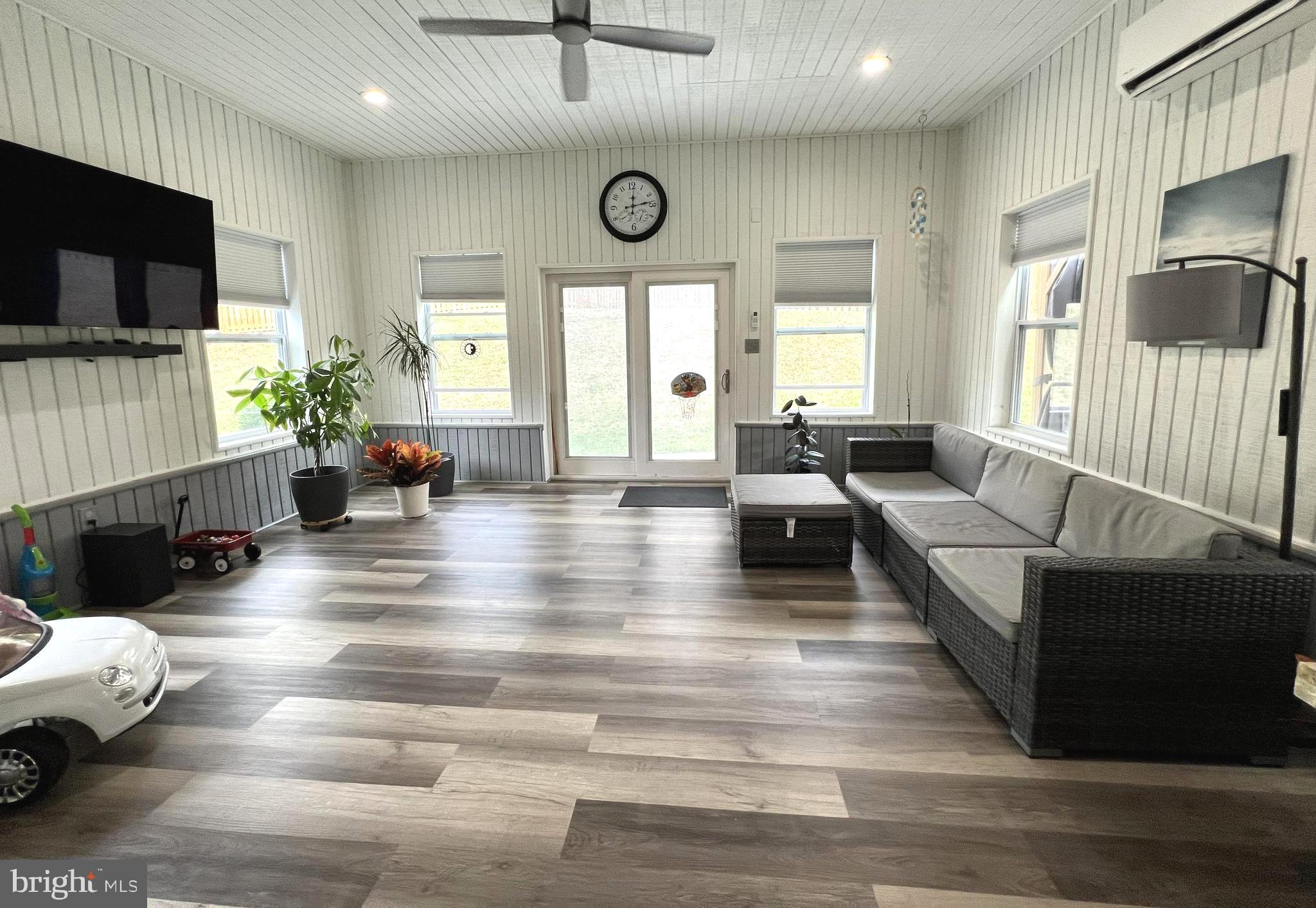 1001 Gabel Street Silver Spring, MD 20901 - Photo 31 of 46 a living room with furniture and a flat screen tv