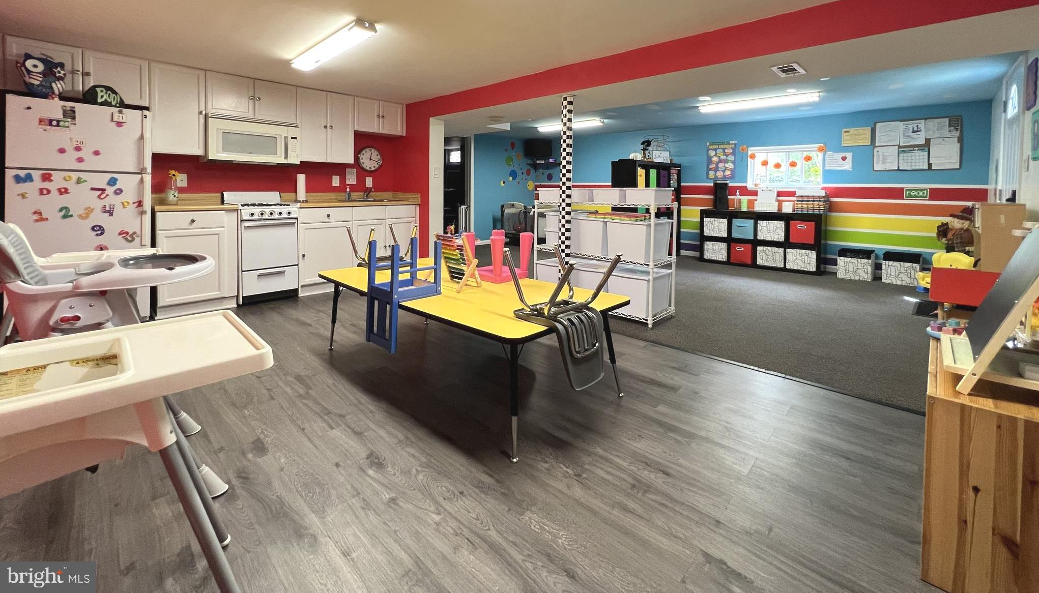 1001 Gabel Street Silver Spring, MD 20901 - Photo 40 of 46 a living room with furniture and a flat screen tv