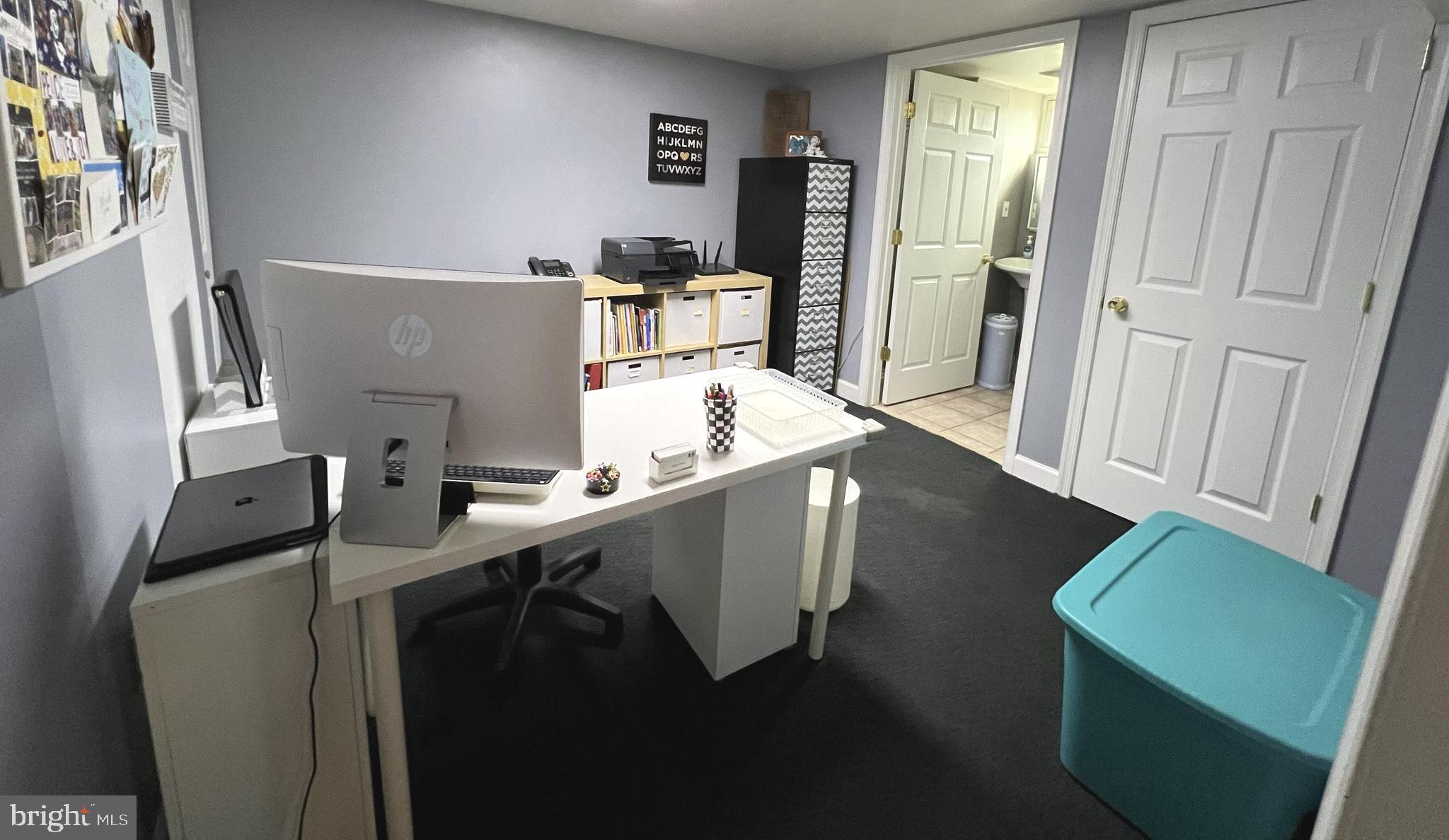 1001 Gabel Street Silver Spring, MD 20901 - Photo 42 of 46 a room with chairs cabinets and wooden floor