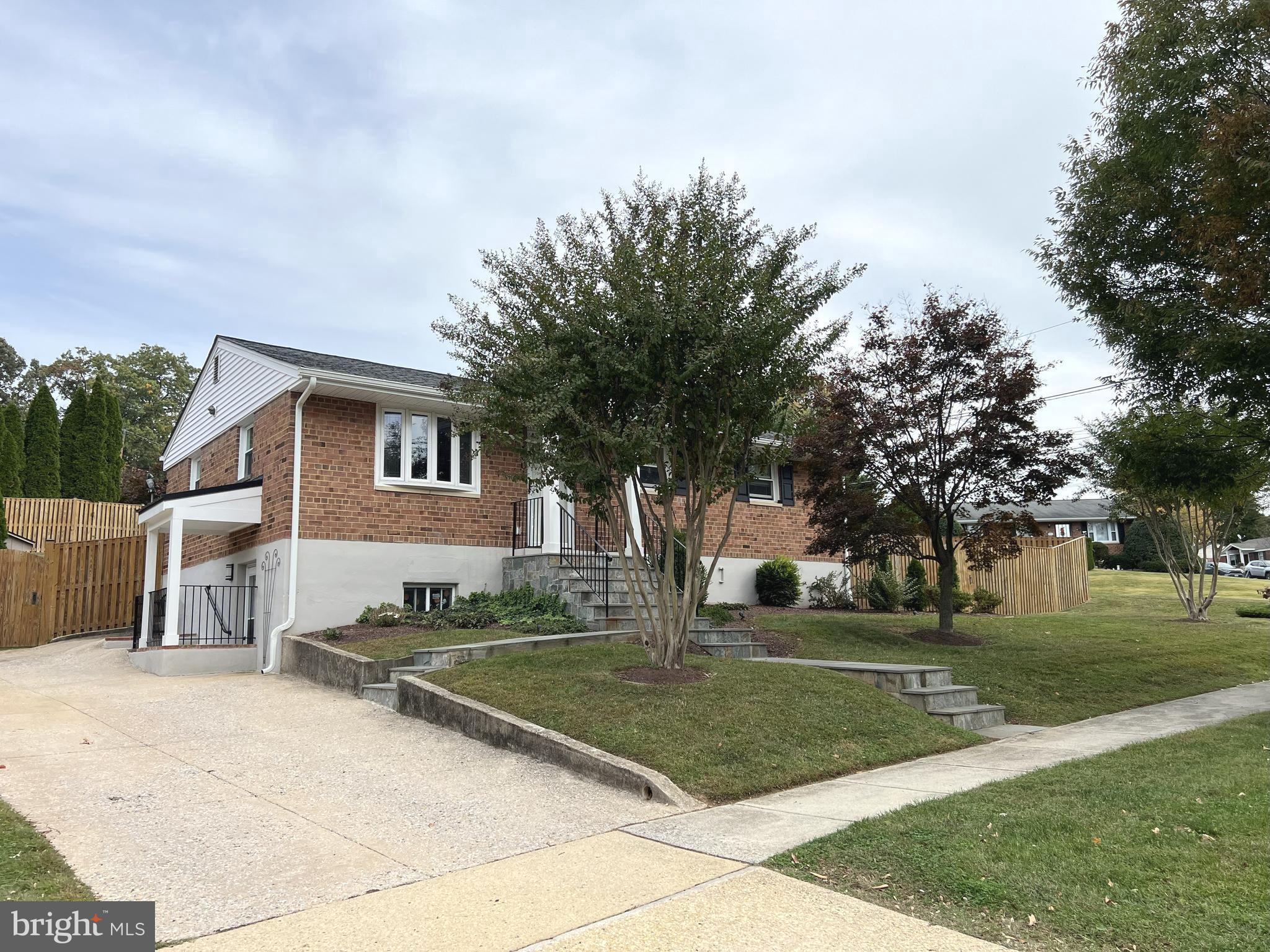 1001 Gabel Street Silver Spring, MD 20901 - Photo 5 of 46 a front view of a house with a yard