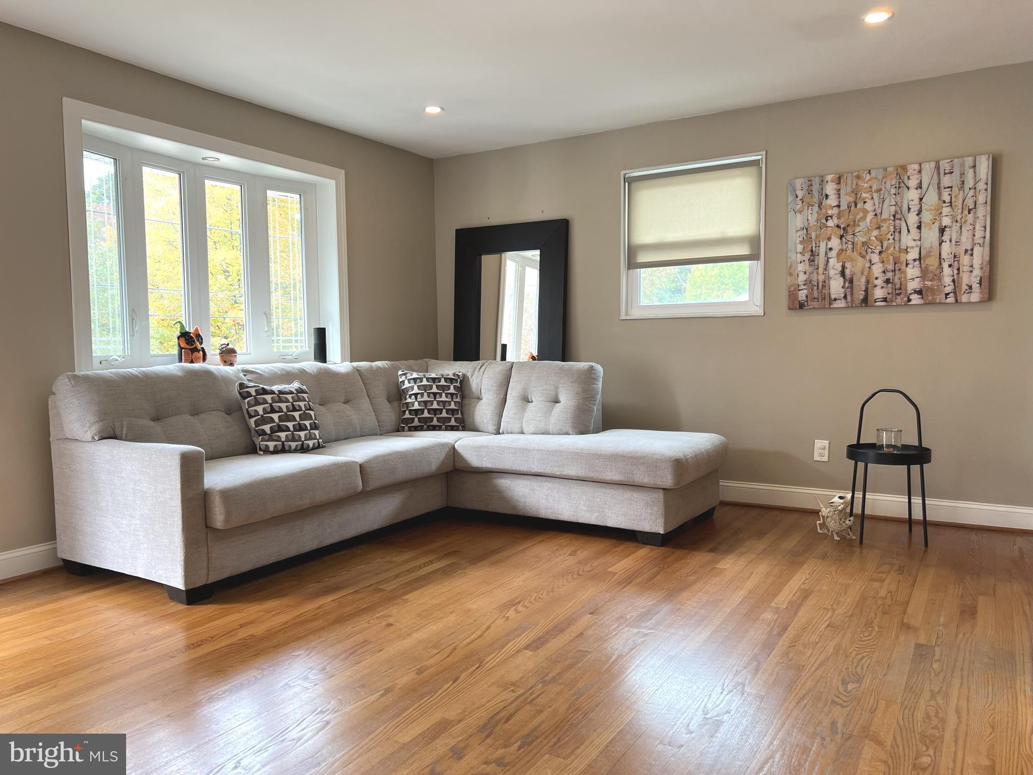 1001 Gabel Street Silver Spring, MD 20901 - Photo 7 of 46 a living room with furniture and wooden floor