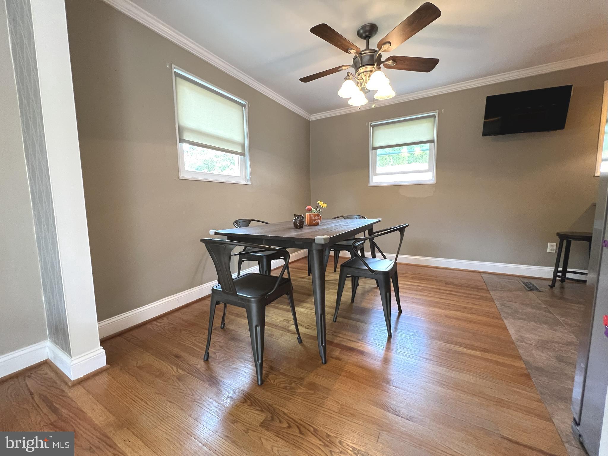 1001 Gabel Street Silver Spring, MD 20901 - Photo 10 of 46 a view of a dining room with furniture and wooden floor