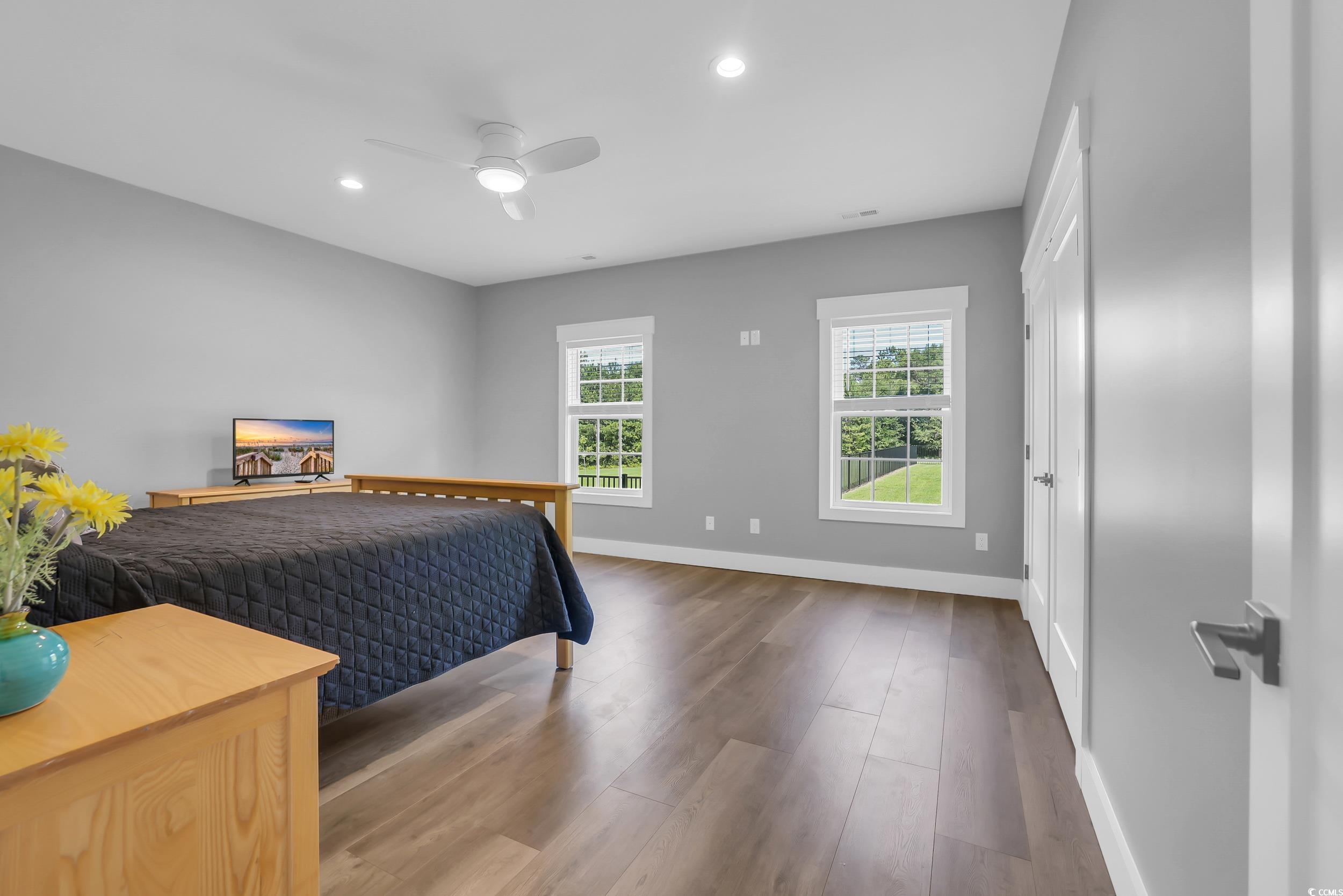 7356 Johnson Shortcut Road Conway, SC 29527 - Photo 21 of 40 Bedroom featuring dark wood-style flooring, recessed lighting, and a ceiling fan