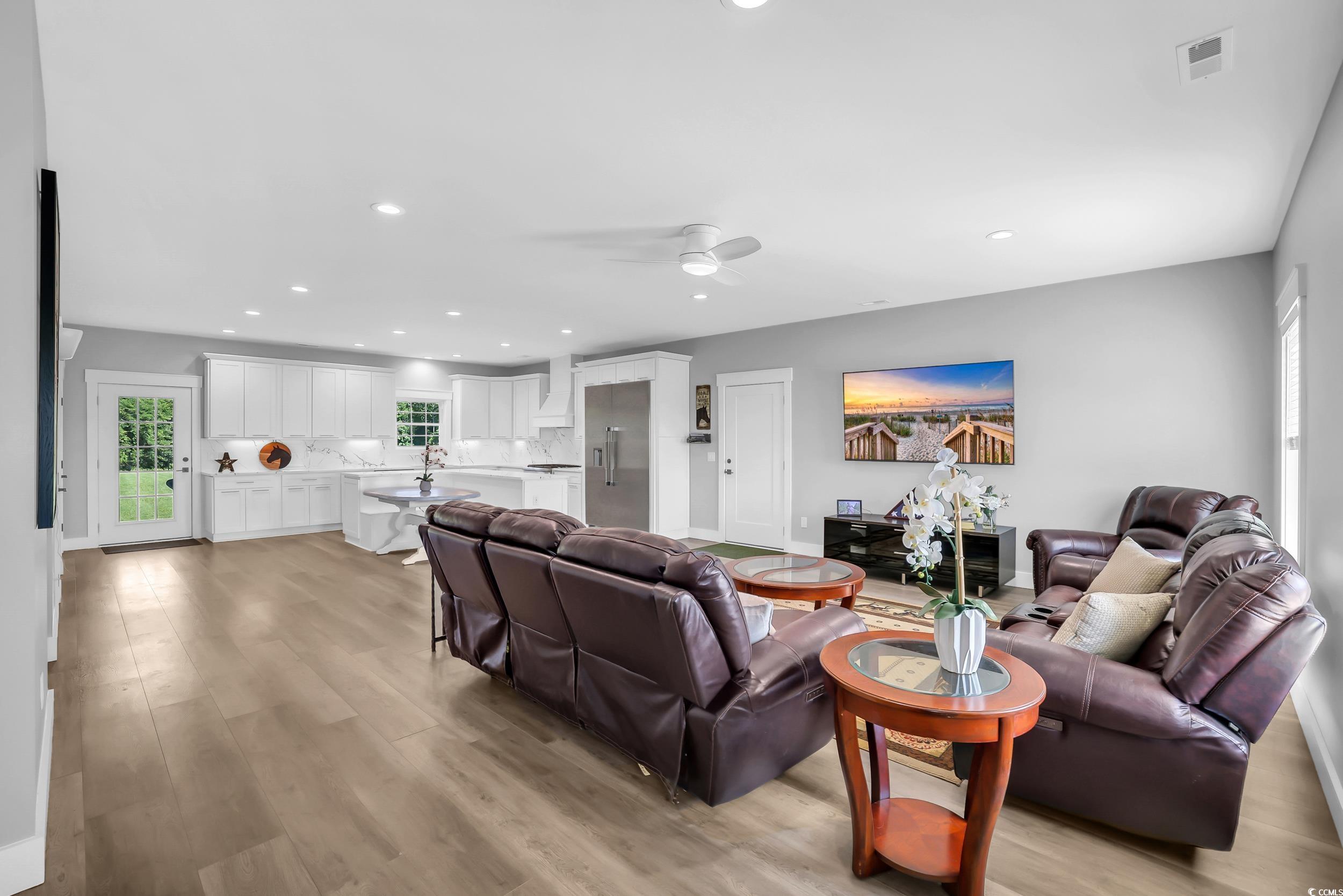 7356 Johnson Shortcut Road Conway, SC 29527 - Photo 7 of 40 Living area featuring light wood-style floors, recessed lighting, and a ceiling fan