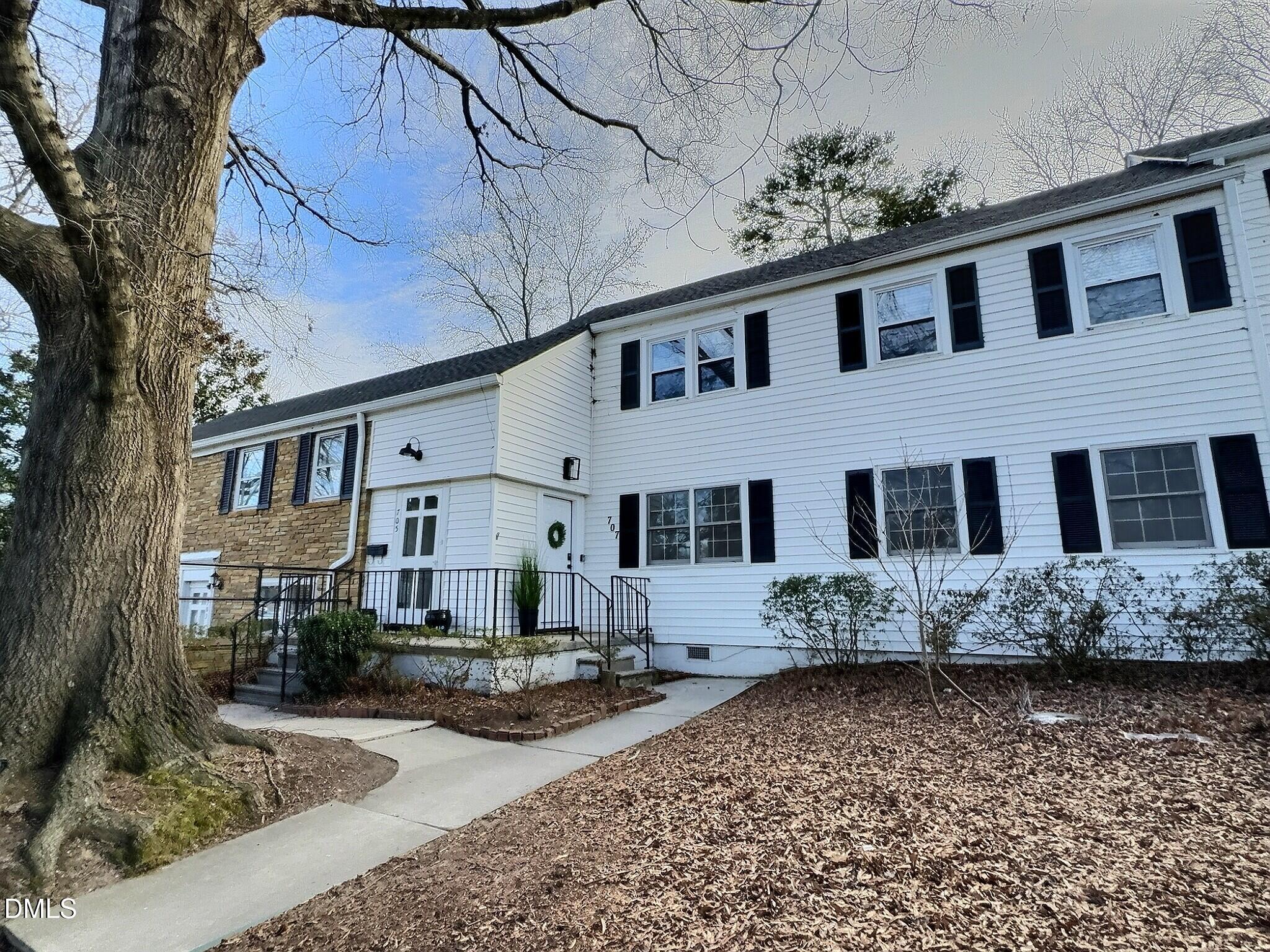 707 Wade Avenue Raleigh, NC 27605 - Photo 3 of 14 a front view of a house with lots of windows