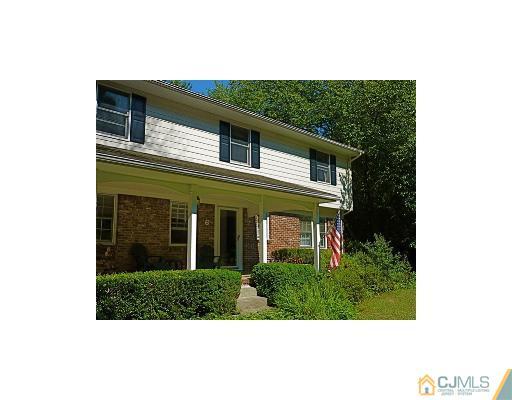 6 Taylor Road Princeton, NJ 08540 - Photo 1 of 10 a front view of a house with a yard