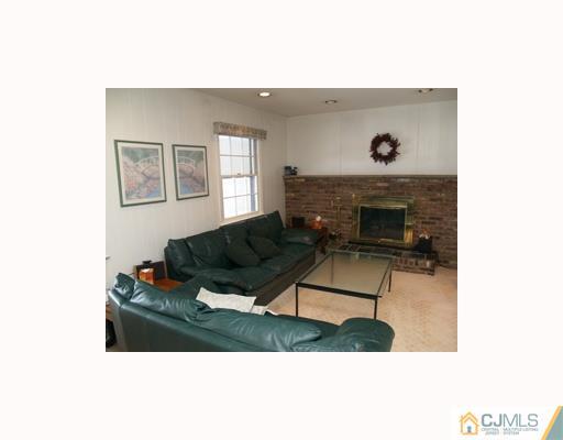 6 Taylor Road Princeton, NJ 08540 - Photo 2 of 10 a living room with furniture and a fireplace