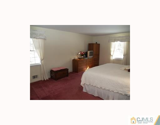 6 Taylor Road Princeton, NJ 08540 - Photo 5 of 10 a bedroom with a bed and a window