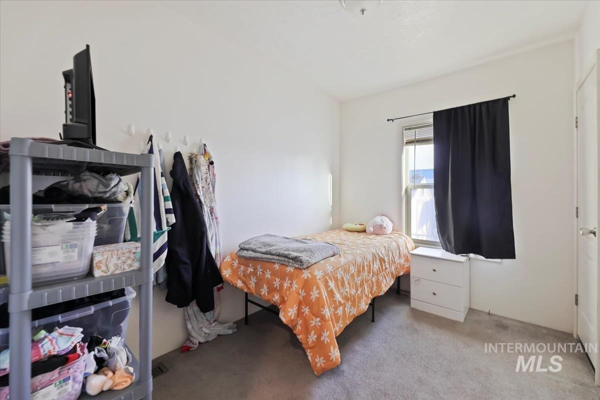 424 West Cherry Lane, Unit 94 Meridian, ID 83642 - Photo 14 of 31 View of carpeted bedroom