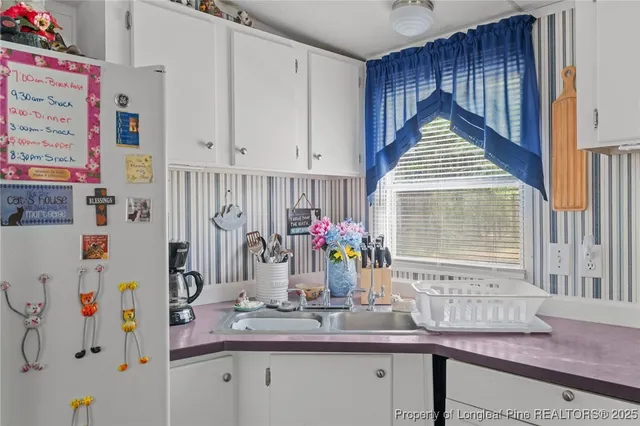 a very nice looking room with many windows