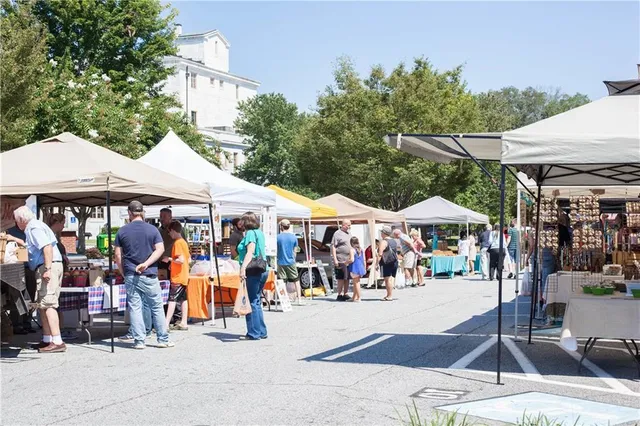 a view of street with sitting area